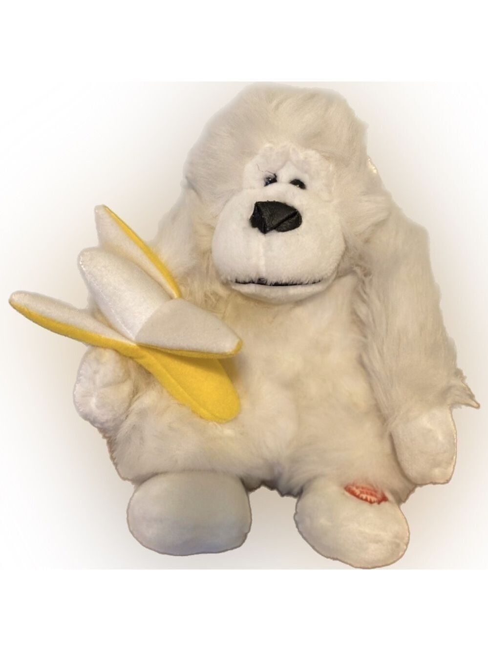 Animated stuffed Gorilla. Press button and he sings and moves Needs 2 AA Battery